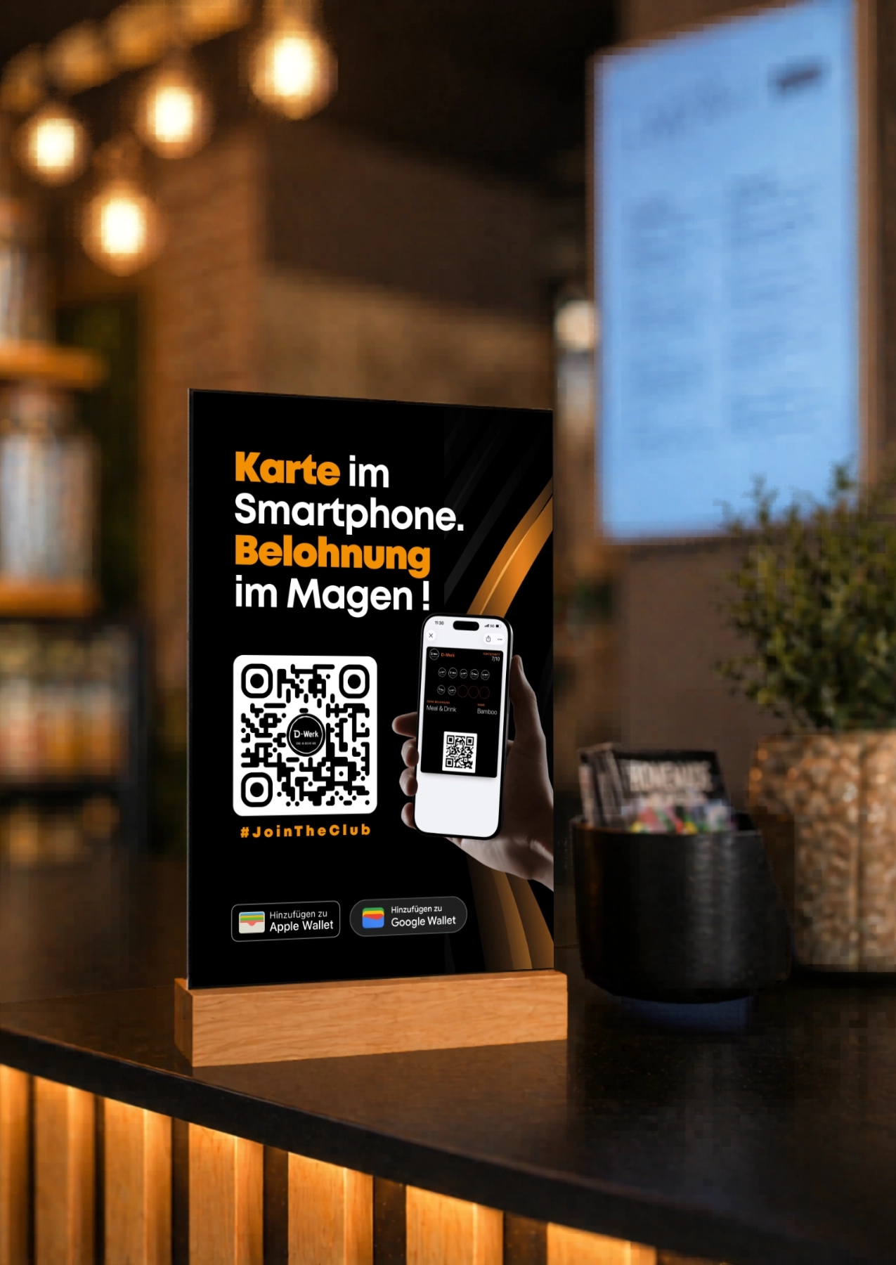 Aufsteller von digistamp im Lokal von D-Werk in Innsbruck: QR-Code zum Beitreten der digitalen Stempelkarte mit Apple- und Google-Wallet-Buttons